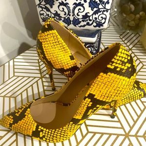 Also-Yellow and Black snake print heels